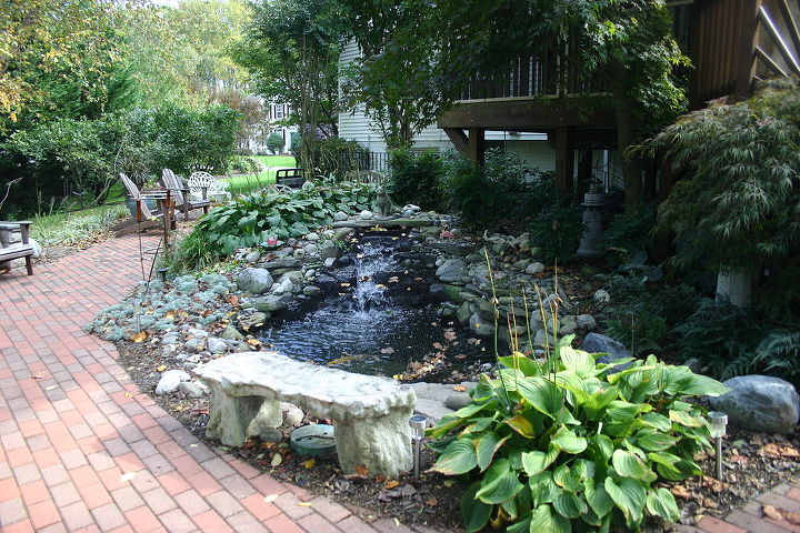pond and patio, outdoor living, patio, And finally what started it all the pond with water fall Their neighbor used to come up and ask if their hose was running not any more Three 24 butterfly Koi live here