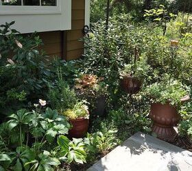 our pennsylvania bluestone patio gets a face lift, diy, patio, tiling, Pots have a new spot in the garden