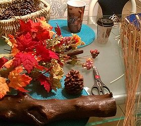 thanksgiving decoration fall mantel decorating, seasonal holiday d cor, thanksgiving decorations, The piece of wood i got last year from my neighbor when he trim his trees the Autumn leaves got it from goodwill 1 49 and the pine cones when I went for a hike pretty cheap huh