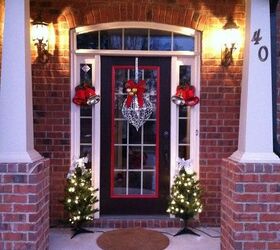 our home all decorated for christmas 2011, Our front door all decorated Instead of a traditional wreath Im so different