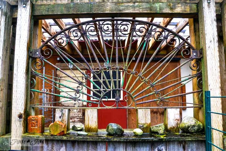 falling for a garden gone wild with amazing reclaimed features, flowers, gardening, outdoor living, repurposing upcycling, But my most favourite piece of all was this amazing metal grate gate in a sunburst design The tones of rust made it look like a work of art