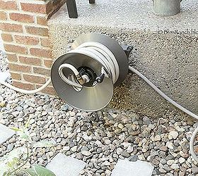 eley rapid reel hose reel, curb appeal, gardening, lawn care, It reels in effortlessly which is a huge reason no one ever rolled the hose up before it was too much work Now it gets reeled in after each use well worth the money over the plastic box kind