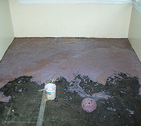 installing a paper bag floor using rit dye, diy, flooring, how to, Starting at one end of your floor begin gluing your paper bag pieces to the floor the purple color actually dries brown