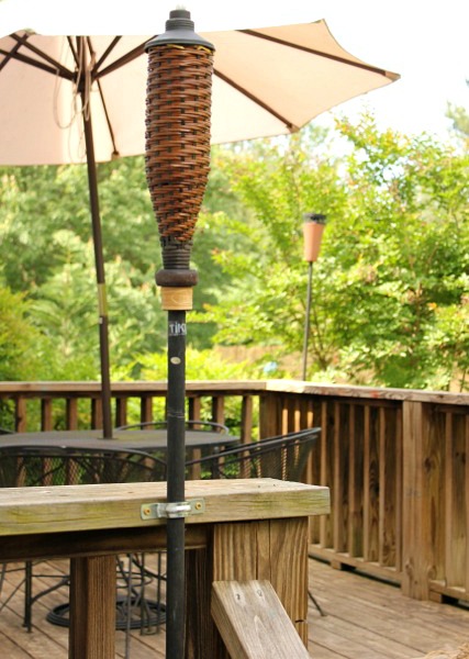 easy way to secure tiki torches, decks, home maintenance repairs, outdoor living