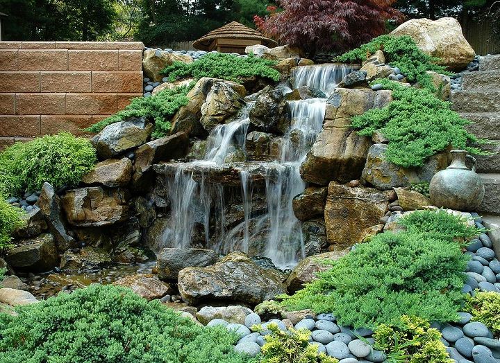 turn a boring retaining wall into an exciting safe water feature, How do you add pizzazz to a normally boring retaining wall Install a pondless water feature Yes Pondless this mean that the water is underground and in a safe area where children can t access it This pondless waterfall was built in