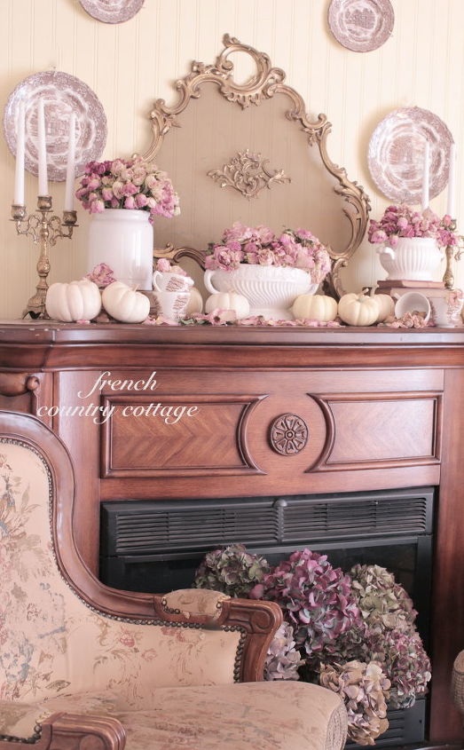 a romantic autumn mantel covered in pinks whites browns and aged gold, home decor
