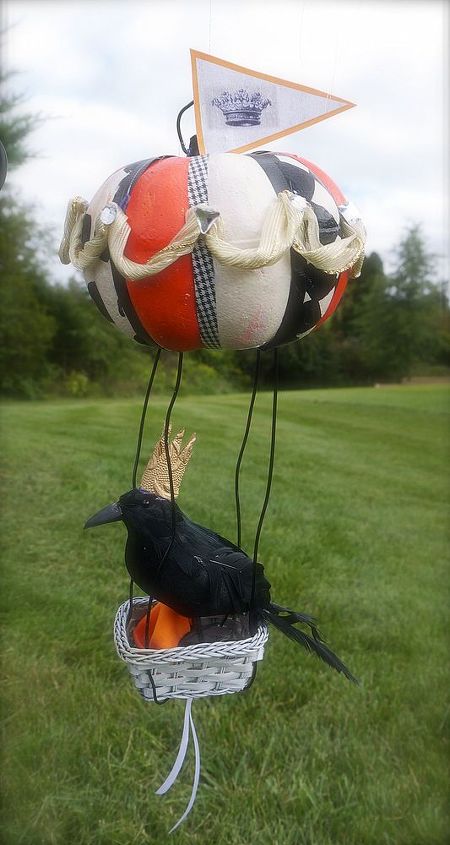 flying pumpkins, halloween decorations, seasonal holiday d cor, a raven gets a royal ride