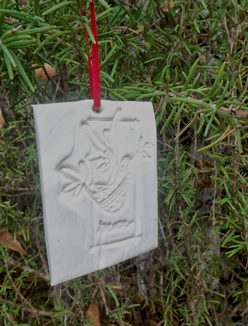 stamped clay ornament, christmas decorations, crafts, seasonal holiday decor, Trim the edges poke a hole in the top then bake according to package directions You can stop here if you d like and hand the ornament on your tree