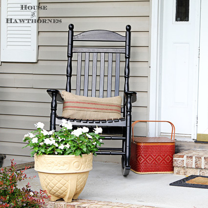 celebrating the red white and blue in style, outdoor living, patriotic decor ideas, seasonal holiday decor, I have a vintage red Redmon picnic basket sitting beside one rocker I take it inside when it rains