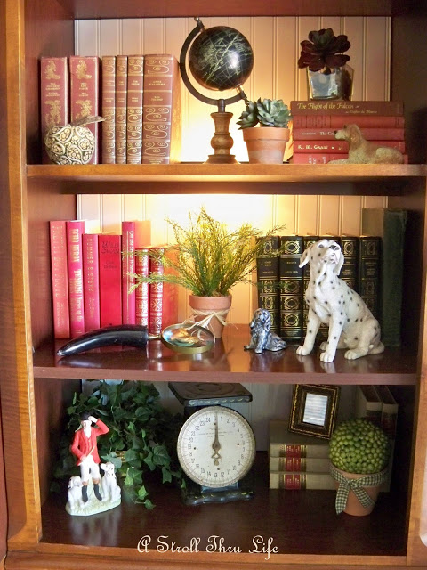 styling bookcases, decks, storage ideas, Colored books add a ton of interest to a bookcase