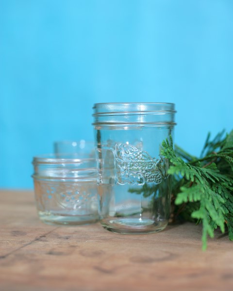 vintage skate swag, mason jars, repurposing upcycling, seasonal holiday d cor, Find two mason jars that will fit inside the skates This will hold the cuttings