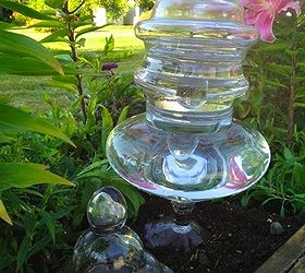 recycled glass garden art towers, crafts, repurposing upcycling, Glass vases and recycled glass tops