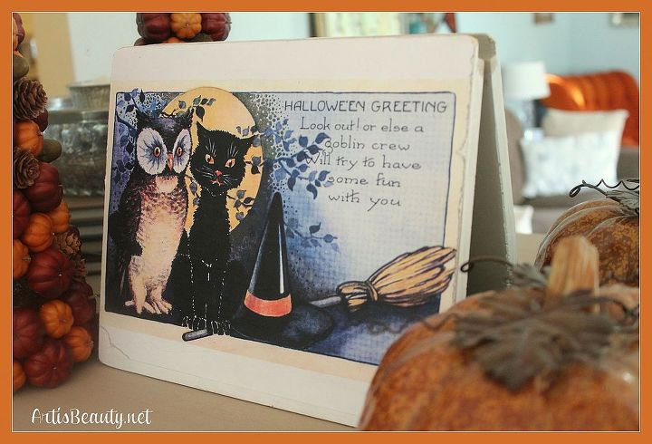 what do you get with modge podge and an old door halloween decor, crafts, halloween decorations, repurposing upcycling, seasonal holiday decor, sitting pretty