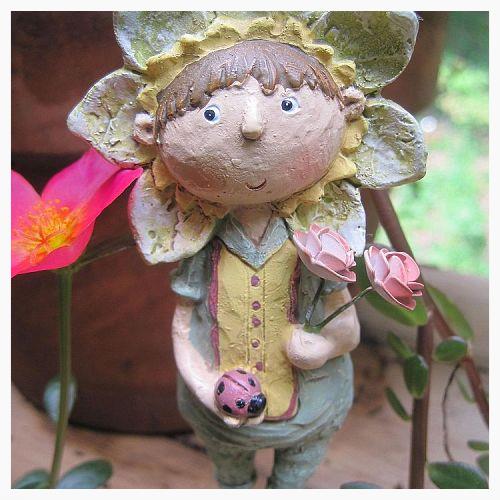 a little whimsy, gardening, Sharon is the rose queen She likes climbing roses the most because they have less thorns