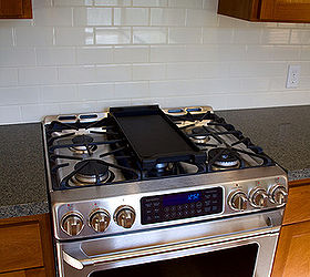 a galley kitchen makeover, home decor, kitchen backsplash, kitchen design, The GE Cafe gas range was a much needed upgrade for our culinary clients