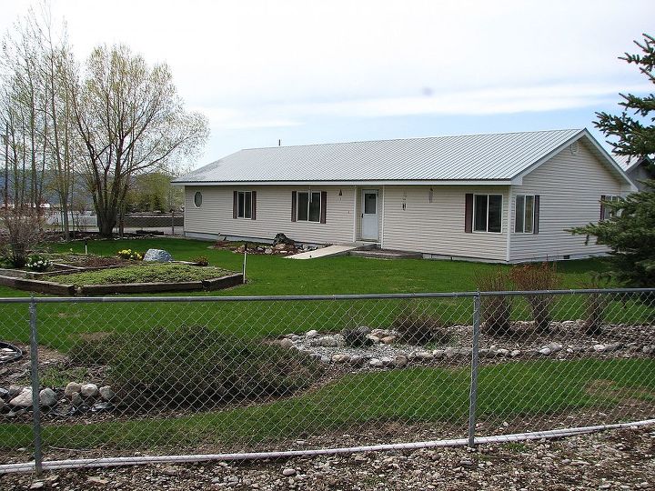 q our front yard pond and other projects, concrete masonry, decks, landscape, outdoor living, ponds water features, Front of house w large garden in front and to the side Entry gate is to the left of the corner of the house Hoping to build deck along the length of house