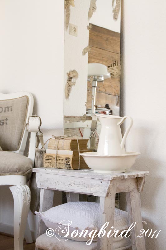 how to alter a mirror and give it an vintage weathered look, crafts, painted furniture, With bits of paper peeping through the mirror this mirror looks aged warn and beautiful