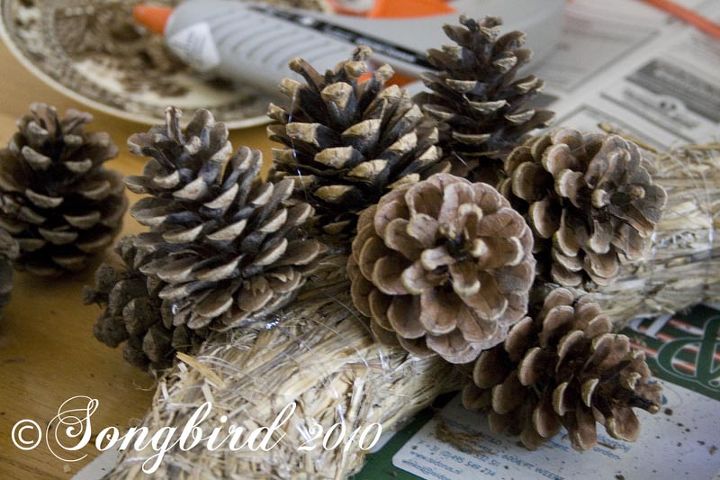 make a pine cone wreath for fall, crafts, wreaths, All you need is a straw wreath hot glue and some patience