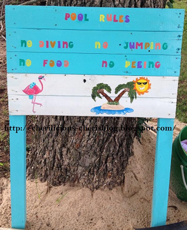 a cute pool sign made from a pallet, outdoor living, pallet, repurposing upcycling