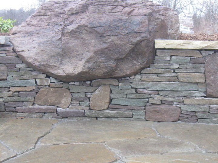 stone sofas and unique outdoor spaces in baltimore md, outdoor living, Stone wall with boulder accents