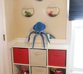 pottery barn isnpired boys bedroom reveal, bedroom ideas, home decor, A Basket storage cubby and port hole Beta Fish Bubbles are guarded by Opie the Octopus