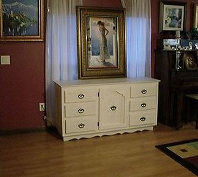 filthy old dresser buffet give new shabby white finish, painted furniture, Now it brightens up our living room and is sturdy enough to display a large piece of art we had just purchased A few doilies and a few trinkets and she will be all dressed