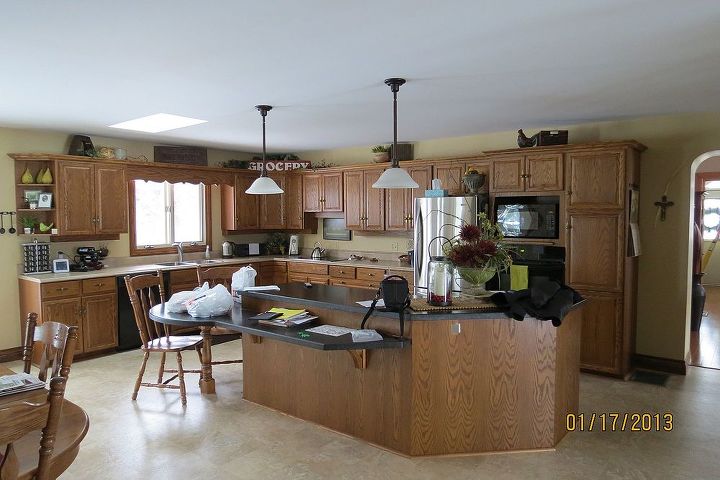 q fabric colour for my valances in my kitchen, home decor, kitchen design, kitchen island, Here are the cabinets lots of wood in the kitchen The island is going to be painted BM Buckhorn darker brown