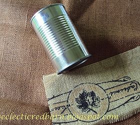 burlap covered cans, crafts, repurposing upcycling, Use any cleaned can this is a soup can Cut your fabric to fit your can but allow a little extra to fold under I used a glue gun to attach the fabric