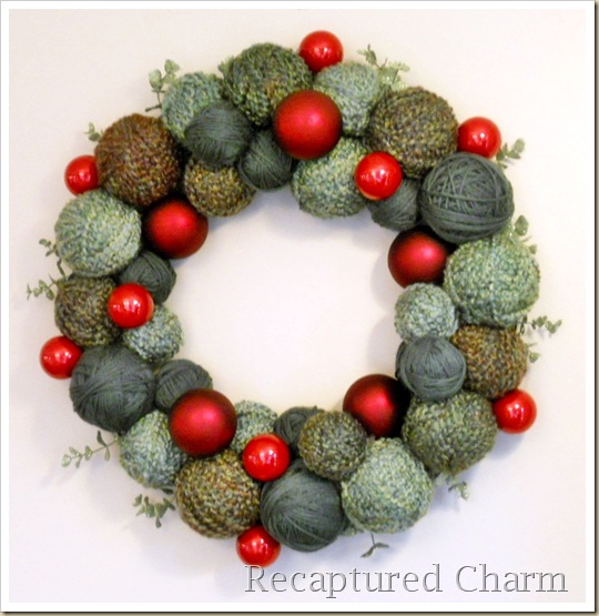 holiday yarn wreath, christmas decorations, crafts, seasonal holiday decor, wreaths, Extra yarn a few assorted sized styrofoam balls a few ornaments of your choice and you have a beautiful holiday wreath Very easy and pretty fun to do