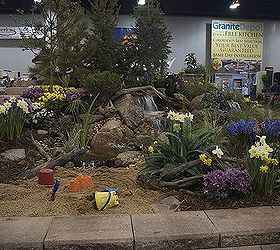 its garden and home show season in colorado, outdoor living, ponds water features, What better to have at the end of a pondless waterfall a sandbox complete with toys