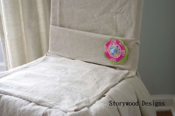 an almost no sew slipcovered chair, crafts, painted furniture, reupholster, I used a pin my preschooler made for mother s day last year as an accent on the chairs sash