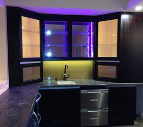 custom bar, entertainment rec rooms, home decor, woodworking projects, Rgb programmable LEDs are in the center display cabinet The side cabinets feature led lit back painted glass inserts to be stylish yet conceal the contents The backsplash is back painted glass so no more cleaning of grouted backsplash for this client