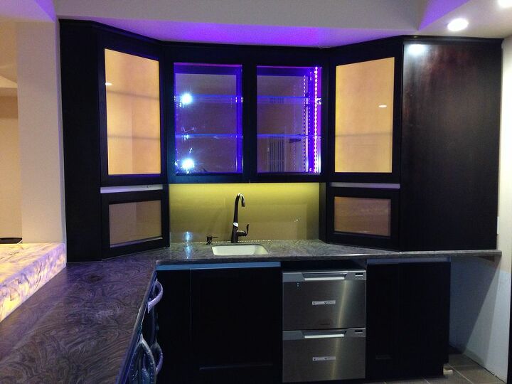 custom bar, entertainment rec rooms, home decor, woodworking projects, Rgb programmable LEDs are in the center display cabinet The side cabinets feature led lit back painted glass inserts to be stylish yet conceal the contents The backsplash is back painted glass so no more cleaning of grouted backsplash for this client