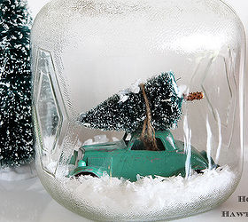 cozy hot cocoa station for the holidays, christmas decorations, seasonal holiday decor, Toy car with a bottle brush tree tied to the top put in a glass jar they sell similar ones at Walmart and Hobby Lobby Fake snow put in the bottom