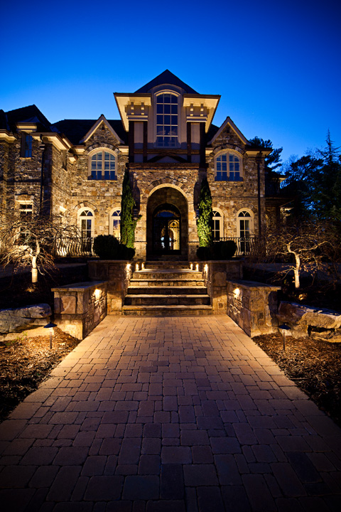 custom in town estate lighting project in buckhead brookhaven ga, curb appeal, electrical, lighting, Front on picture of the home Showcasing some of the custom mounted fixtures in the beautiful stonework