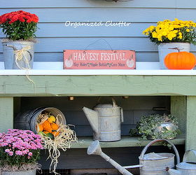 early fall potting bench outdoor decor, gardening, seasonal holiday decor, The potting bench with mums and galvanized watering cans and buckets