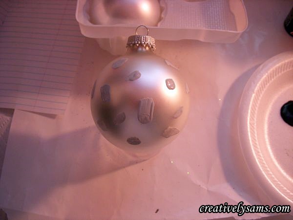 snow leopard ornaments tutorial, christmas decorations, crafts, seasonal holiday decor, First way to make the snow leopard ornaments is to randomly make spots splotches using the grey paint Neatness is not necessary here Some were rounded some were rectangle shaped Let dry