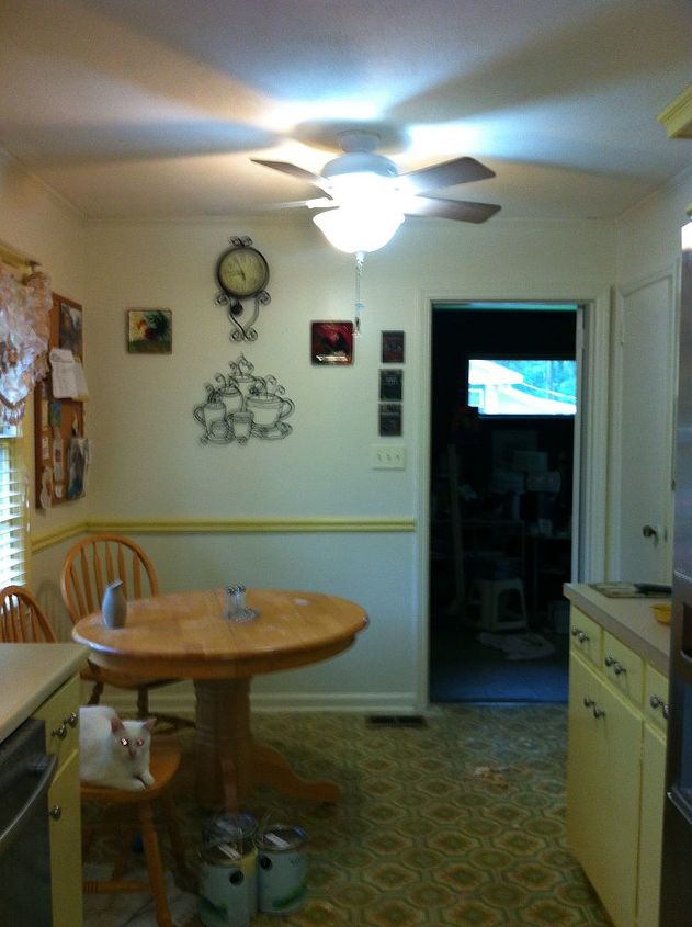 my kitchen redo, kitchen cabinets, kitchen design, painting, The other end of the kitchen with the new chair rail no I didn t miter the corners I ve yet to learn how to do that so it looks a little strange but their all mine I will pull out my dad s mitering box and learn though