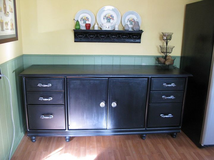 groovy credenza to kitchen buffet, painted furniture, Plywood panels and new hardware on the drawer fronts took this pieced from groovy to gorgeous Bun feet also elevated this piece to buffet status