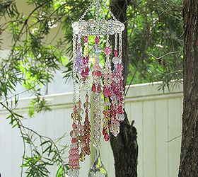 make your garden sparkle with crystals, gardening, outdoor living, Made 14 crystal tassels with Beadalon 49 count stainless steel wire hung each tassel on steel chains at varying lengths Attached each to a circle made of 18 gauge steel wire with round crystals strung between each tassel