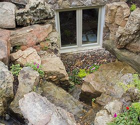 waterfalls for window wells, A mix of plants and rock was used to provide a fantastic view