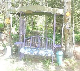 whimsical garden ideas, gardening, This is not the best picture but it shows some of the celestial items and mirrors that I put in my forest I also put glow in the dark stars on the trees