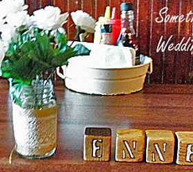 diy rustic wedding accessories, crafts, repurposing upcycling, I used the blank side of vintage blocks to create my own letters to spell out their last name I first stenciled the letters then wood burned the outline and finally painted the inside