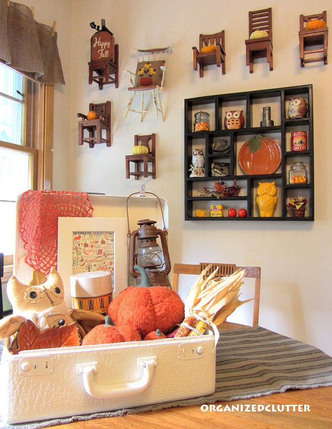 pumpkins and owls, seasonal holiday decor, On the wall with the shadow box Pottery Barn chairs with mini pumpkins a Black Eyed Susan pillow and fall sign On the table a fall suitcase vignette