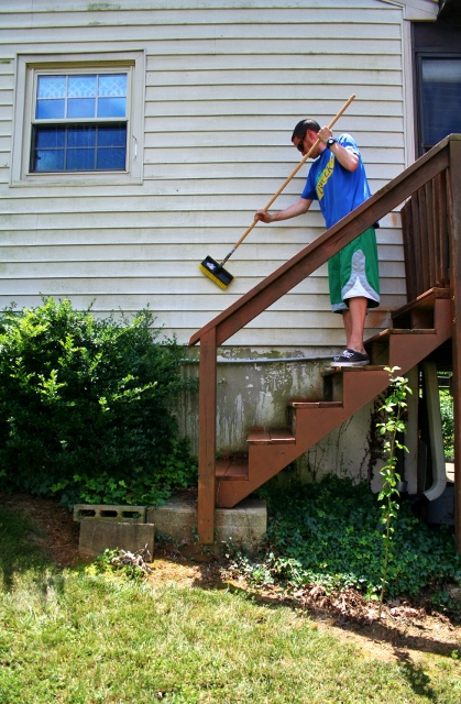 how to clean vinyl siding, cleaning tips, curb appeal, Next put your back into it Scrub baby scrub