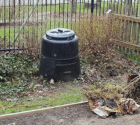 how to build a composting system from pallets, composting, diy, gardening, go green, how to, pallet, repurposing upcycling, This is what we started with just an area in the yard with a black municipal composting bin