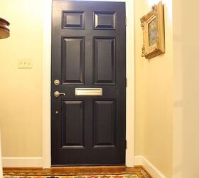 a different rug adds a pop of color to a small space, flooring, foyer, home decor, window treatments, Other than the rug my other favorite change to the foyer was painting the door Naval by Sherwin Williams It s the best shade of navy on the market I think