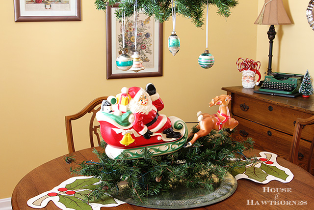 fun retro christmas dining room tour, christmas decorations, seasonal holiday decor, I used one of my blow molds as a centerpiece