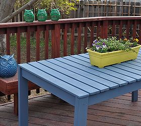 colorful outside picnic table, outdoor furniture, outdoor living, woodworking projects, You don t always have to go with tan and white for patio furniture We built our own primarily because I wanted to add color to a drab porch