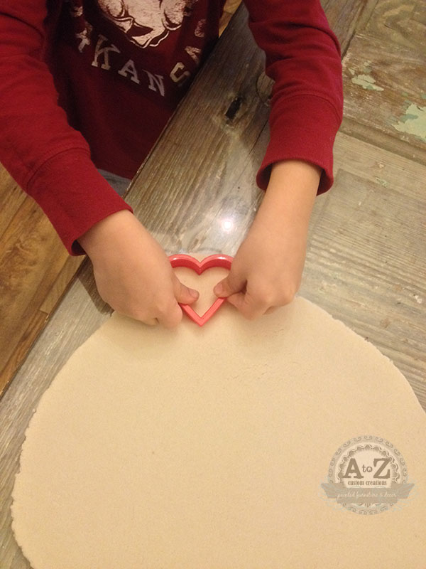 fun valentine s day decorating project to do with kids, crafts, seasonal holiday decor, valentines day ideas, Cookie cutters make this part fun and easy
